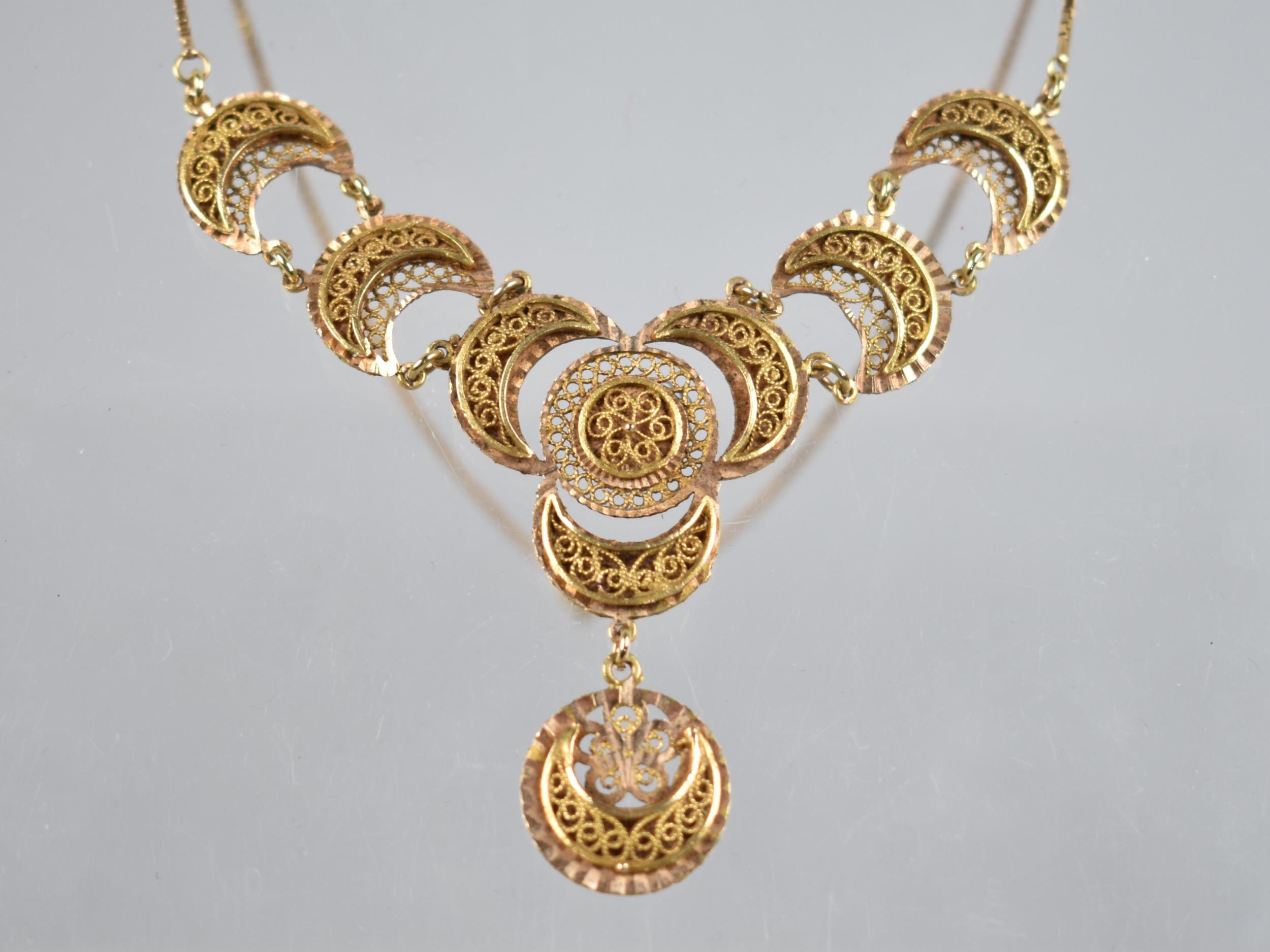 A Two Tone Gold Metal Filigree Necklace Comprising Crescents Raised on Textured Plaques, Each 16mm - Image 2 of 3