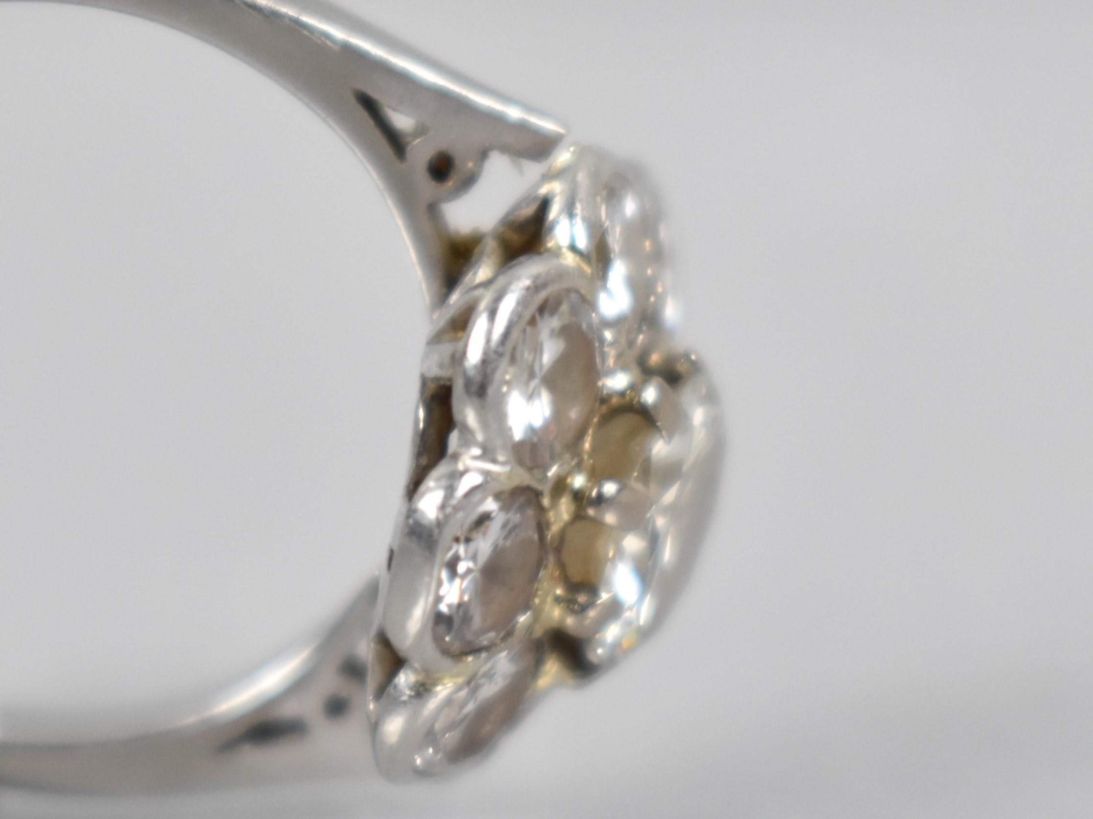 A Platinum and Diamond Daisy Cluster Ring (At Fault), Central Round Cut Diamond Measuring 6.31mm - Image 4 of 14