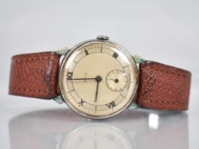 A 1930s Smiths Wrist Watch, Champagne Face with Baton Hands, Black Roman Numerals and Subsidiary