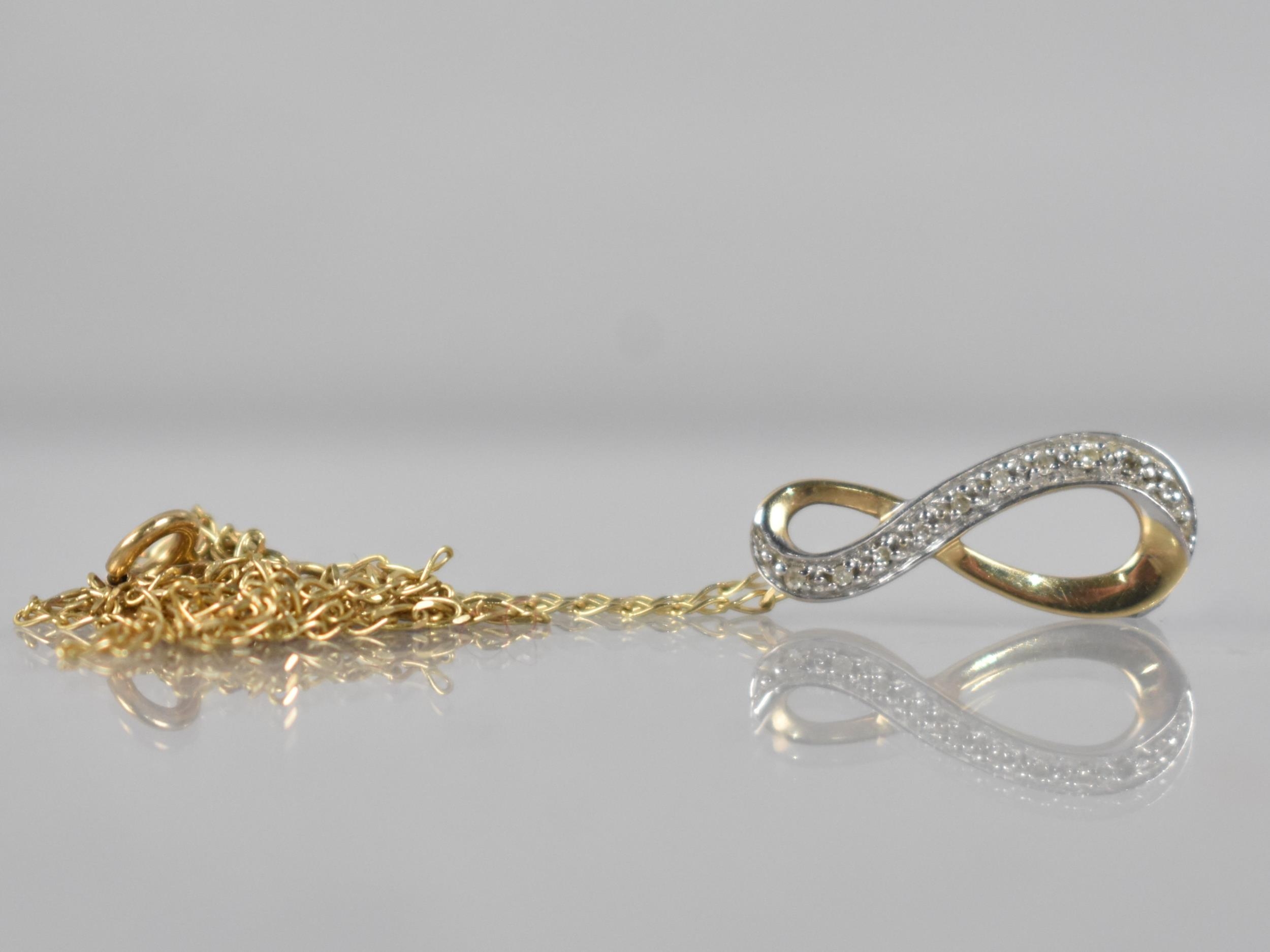 A Diamond Mounted Pendant on 9ct Gold Chain, Ten Round Cut Diamonds Milgrain Set in White Metal to - Image 2 of 2