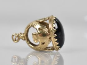 A 9ct Gold Mounted Fob, Cabochon Onyx Stone Measuring 15.7mm by 11.9mm and Mount with Crowned