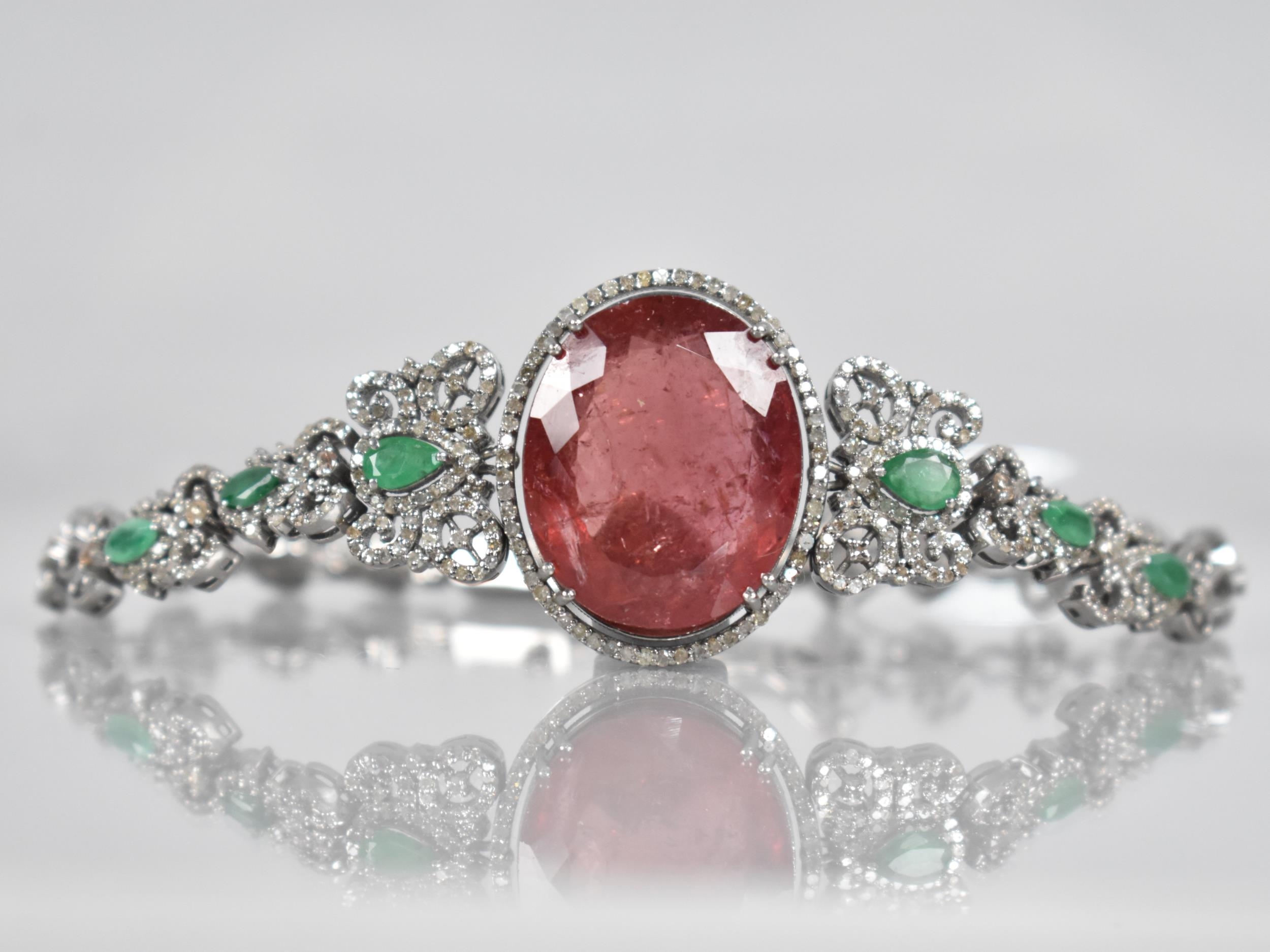 A Rubellite, Emerald and Diamond Bracelet. Large Oval Cut Rubellite Stone Measuring 26.42cts, 22.9mm - Image 2 of 3