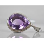 An Amethyst and Diamond Mounted Pendant, Large Central Pear Cut Amethyst Measuring 46.50ct Approx,