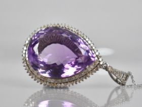 An Amethyst and Diamond Mounted Pendant, Large Central Pear Cut Amethyst Measuring 46.50ct Approx,