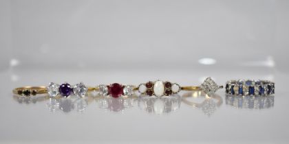 A Collection of Various Rings to include 9ct Gold and Smokey Quartz Trilogy Ring, a Blue and White