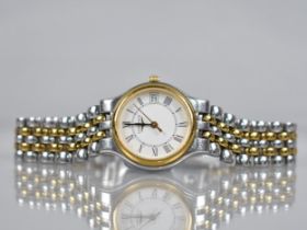 A Ladies Longines Wrist Watch, White Dial with Roman Numerals and Minute Chapter Ring, Date Aperture