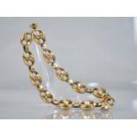 A Gold Metal Mariner Link Bracelet, Twelve Hollow Links Measuring 12mm by 9mm, 19.8mm Long Approx,