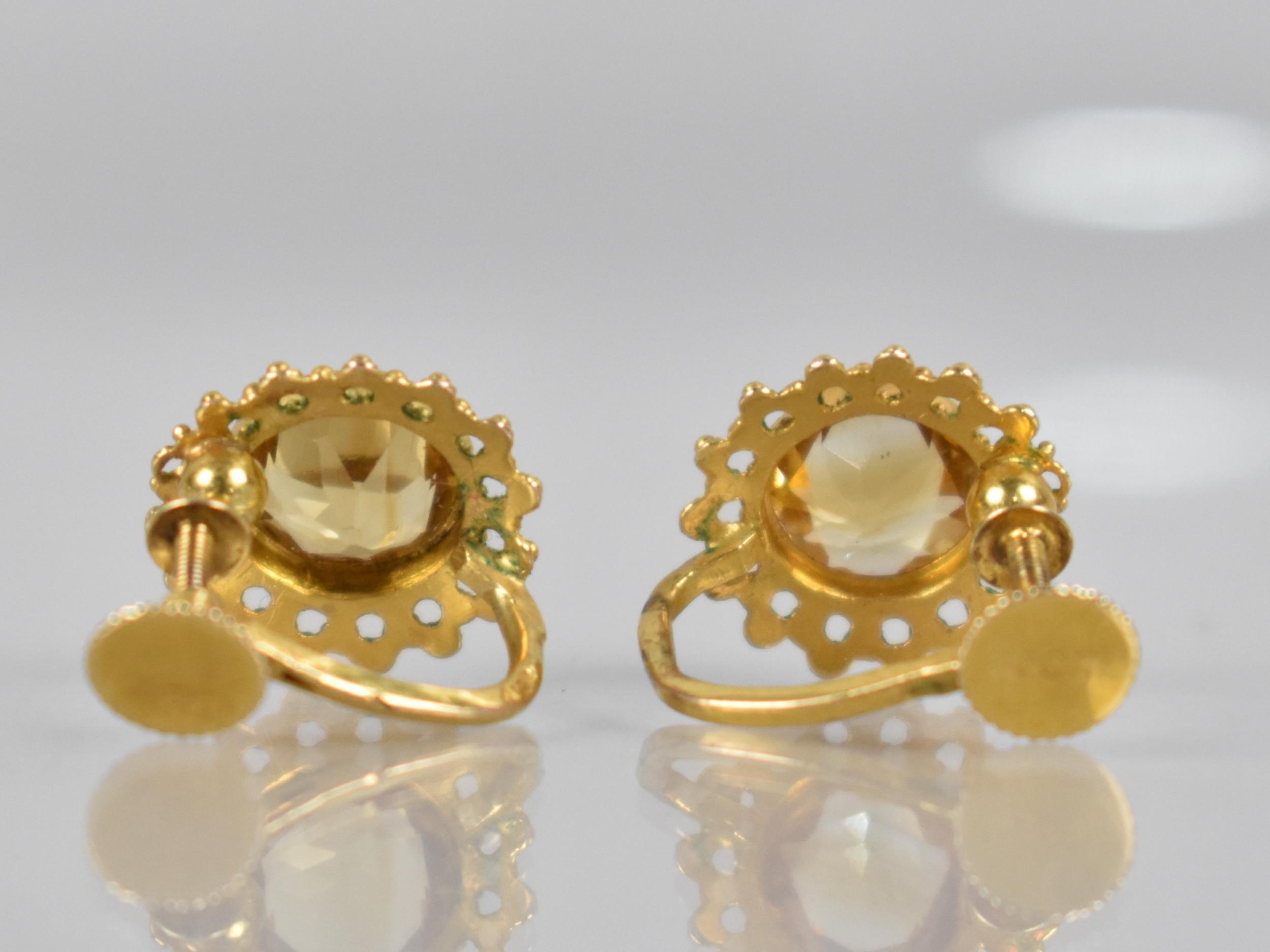 A Pair of 9ct Gold and Untested Citrine Type Stone Mounted Screw Back Earrings, Central Round Cut S - Image 2 of 2