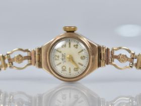 A Vintage 9ct Gold Cased Ladies Wrist Watch by Avia, Circular Champagne Dial with Arabic Numerals