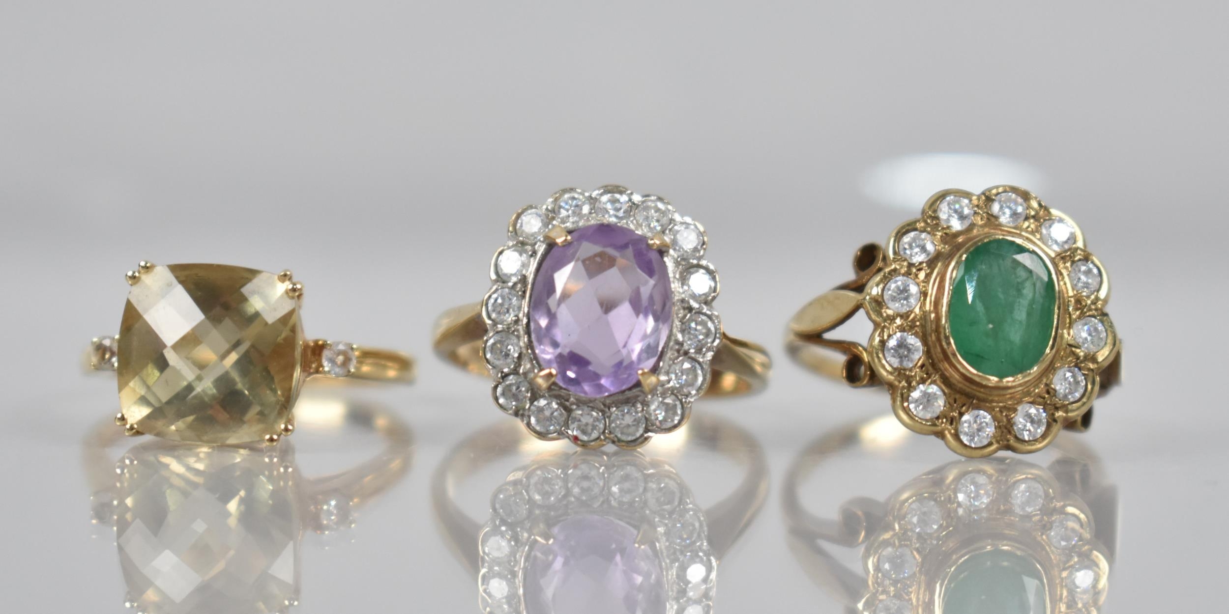 A Collection of Three 9ct Gold Mounted Jewelled Rings to include Citrine and White Sapphire,