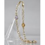 A 9ct Gold Multi-Jewelled Bracelet, Three Pear Cut Stones Comprising Topaz, Amethyst and Citrine (