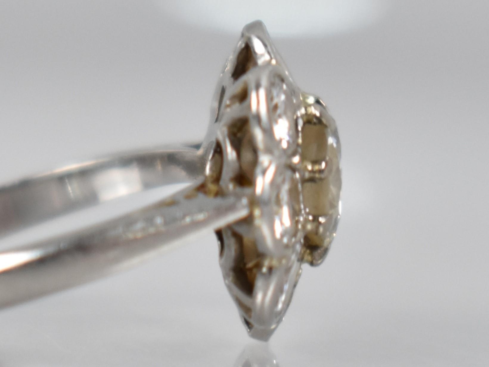 A Platinum and Diamond Daisy Cluster Ring (At Fault), Central Round Cut Diamond Measuring 6.31mm - Image 6 of 14