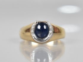 A 9ct Gold and White Metal Cabochon Sapphire Mounted Dress Ring, Central Oval Stone Measuring Approx