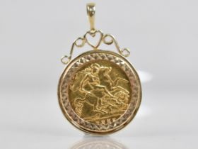 A 1982 Elizabeth II Half Sovereign in a 9ct Gold Mount, Total Weight 5.8gms