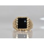 A 9ct Gold Gents Signet Ring, Rectangular Onyx Panel (11.1mm by 9.7mm) Supported on a Fluted Head,