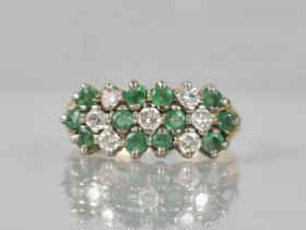 An 18ct Gold, Emerald and Diamond Cluster Ring Comprising Seven Claw Set Round Brilliant Cut