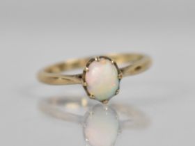 A 9ct Gold Opal Mounted Ring, Oval Cabochon Stone 7.2mm by 5.5mm, Raised in Eight Claws to Reverse