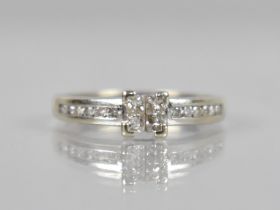 A 9ct White Gold and Diamond Ring Comprising Four Square Cut Diamonds Measuring 1.9mm Square Each,