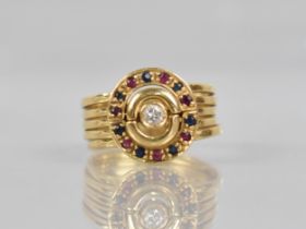 An 18ct Gold, Diamond, Ruby and Sapphire Dress Ring, Comprising Five Bound Bands, Central with Round
