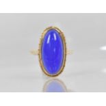 A 9ct Gold and Blue Chalcedony Agate (untested) Dress Ring, Oval Cabochon Stone Measuring 21mm by