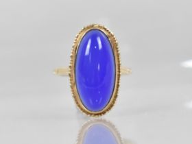 A 9ct Gold and Blue Chalcedony Agate (untested) Dress Ring, Oval Cabochon Stone Measuring 21mm by