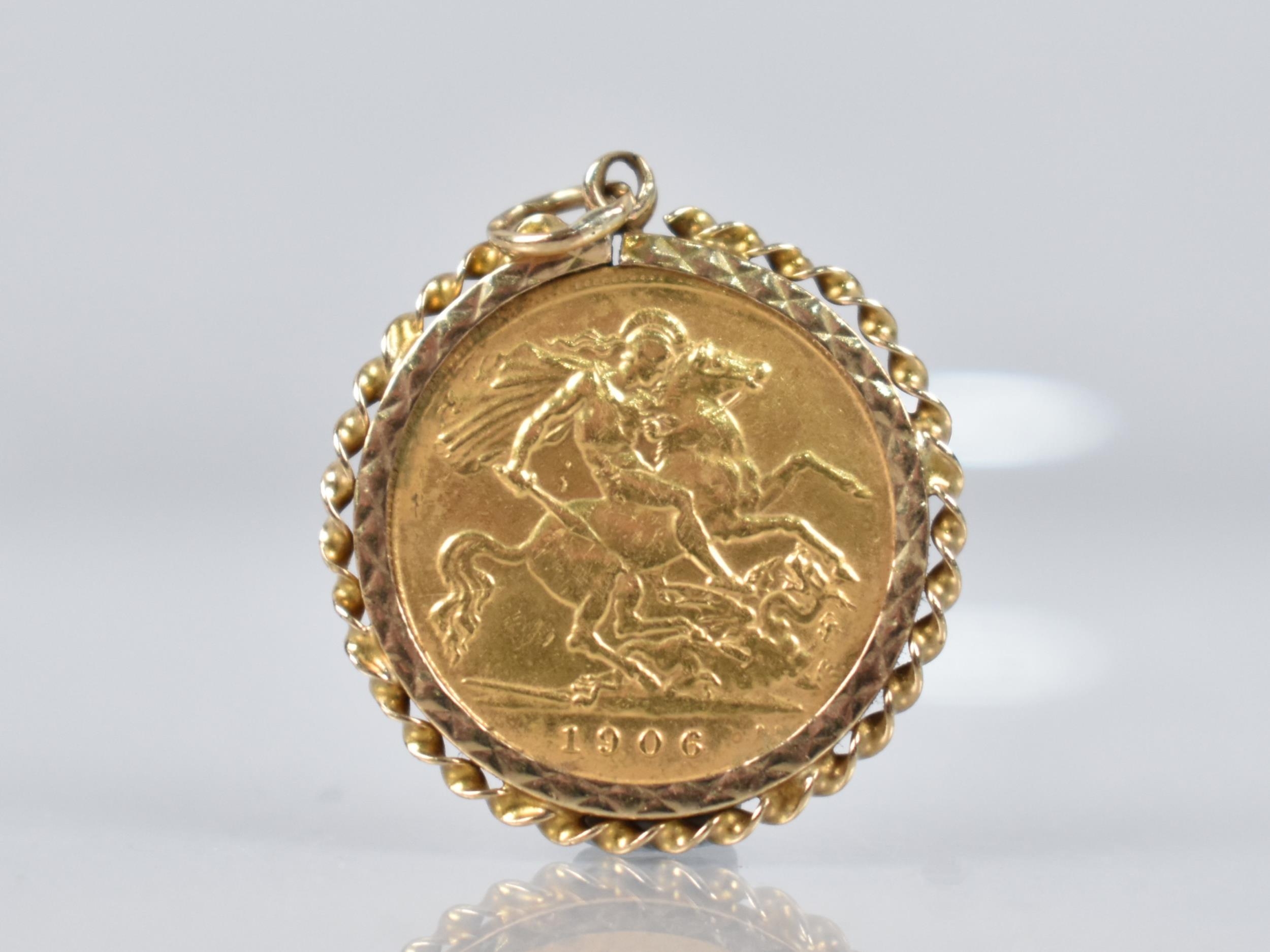 A 1906 Edward VII Half Sovereign in 9ct Gold Mount, 5.1gms