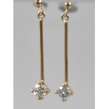 A Pair of Diamond Earrings, Round Cut Diamonds Measuring 2.8mm Diameter Held in Four Yellow Metal