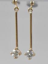 A Pair of Diamond Earrings, Round Cut Diamonds Measuring 2.8mm Diameter Held in Four Yellow Metal