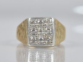 A 9ct Gold and Diamond Ring, Nine Round Brilliant Cut Stones Measuring 2.2mm Diameter Grain Set in