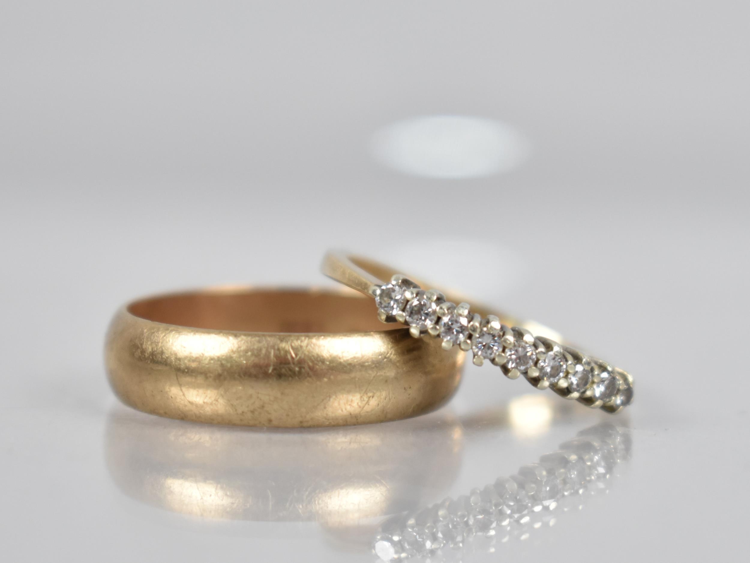 A 9ct Gold Half Eternity Ring, Mounted with Round Brilliant Cut Diamonds in White Metal to a Plain