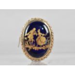 A 9ct Gold Framed Limoges Brooch, Blue Enamelled Ground with Gilt Decoration Depicting Lovers in
