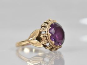 A 9ct Gold and Amethyst Ladies Dress Ring, Large Round Cut Stone Measuring 12.3mm Wide, Ten Claws