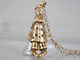 A Large 9ct Gold and Jewelled Articulated Clown Pendant, Missing One Coloured Paste Stone, 69.1mm