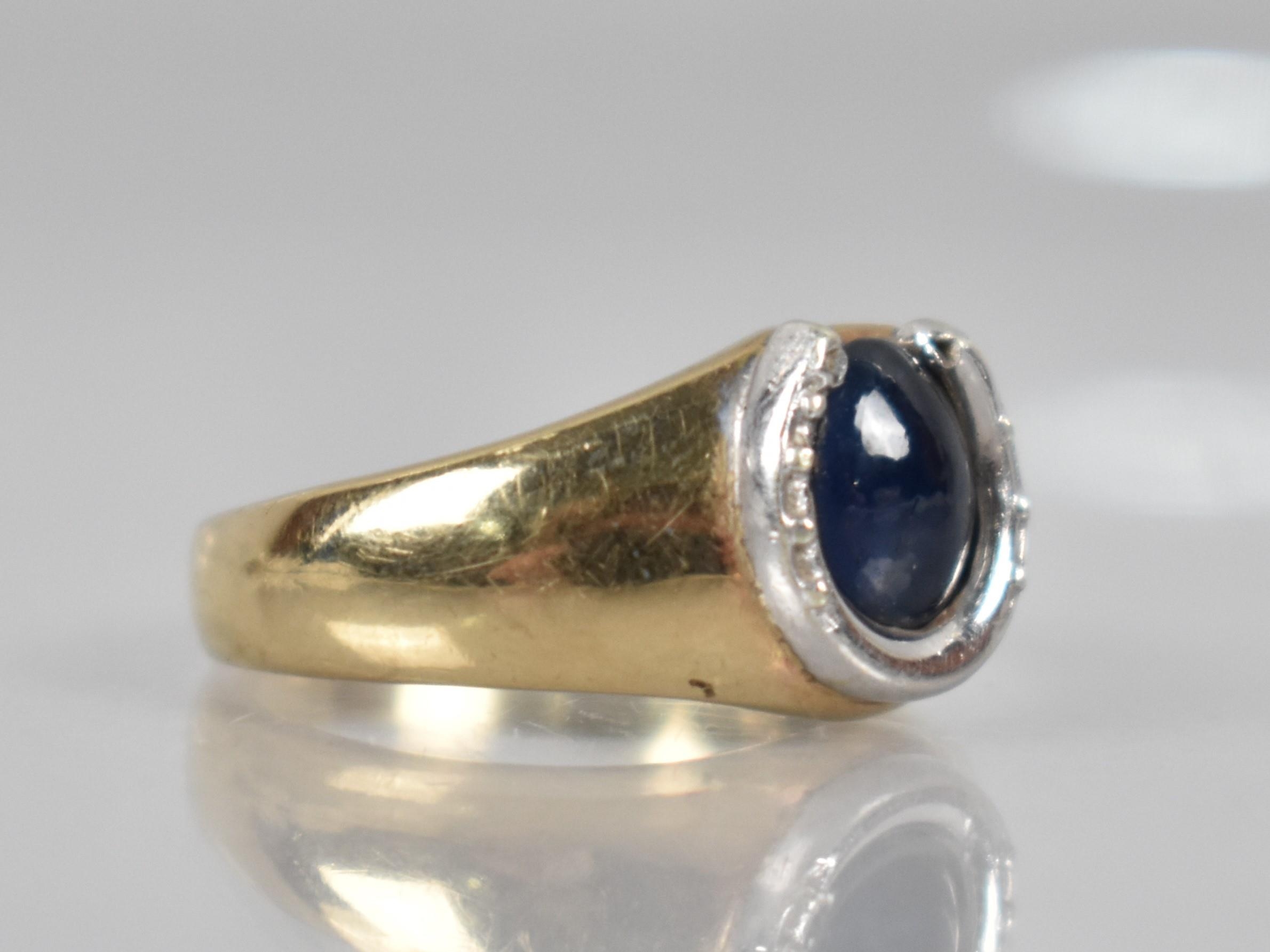 A 9ct Gold and White Metal Cabochon Sapphire Mounted Dress Ring, Central Oval Stone Measuring Approx - Image 2 of 3