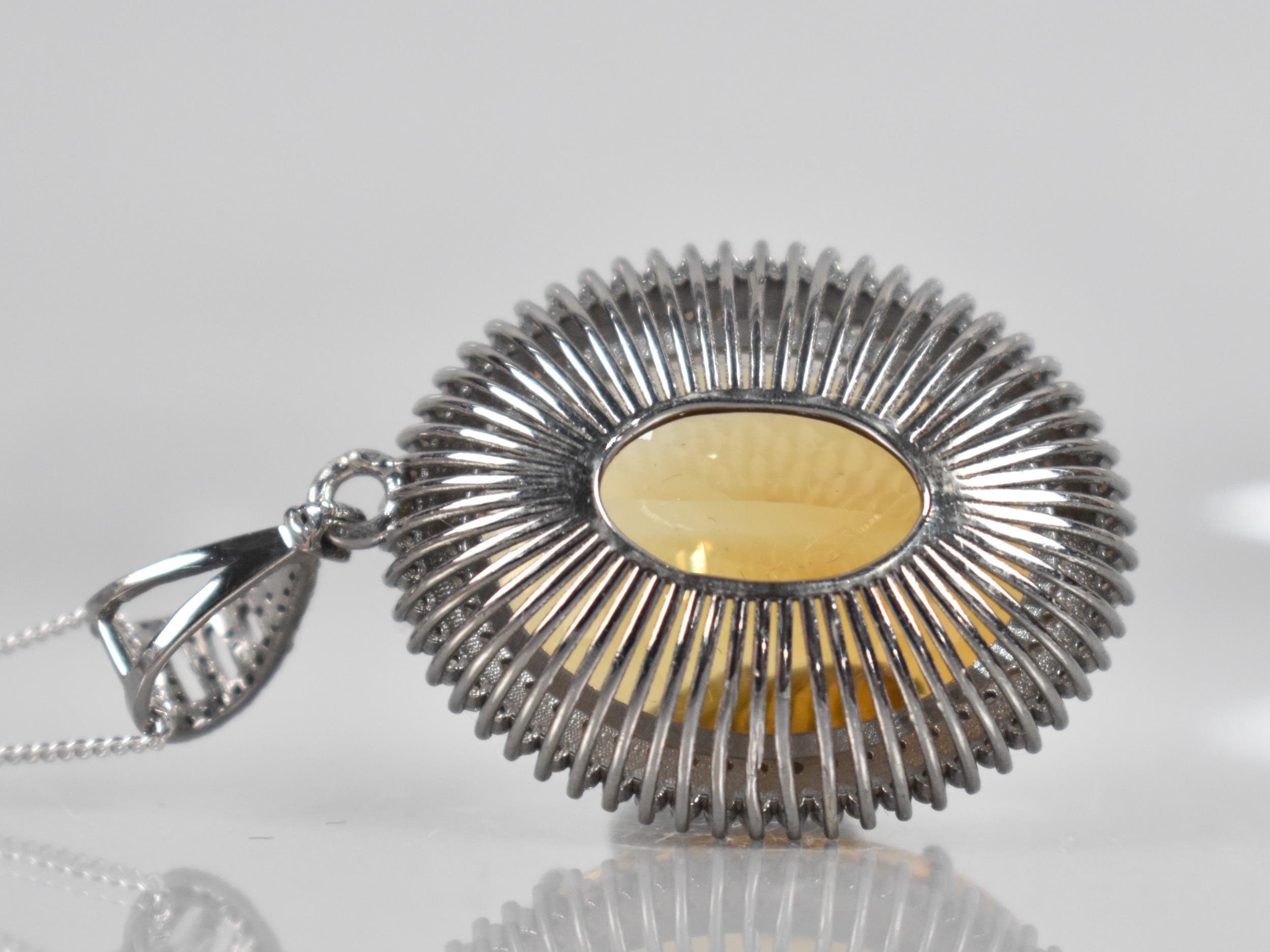 A Large Citrine and Diamond Mounted White Metal Pendant, Central Oval Cut Citrine Measuring 44. - Image 2 of 2