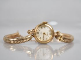 A Ladies 9ct Gold Rolex Wristwatch, Circular Champagne Face with Arabic Numerals and Arrow Hour