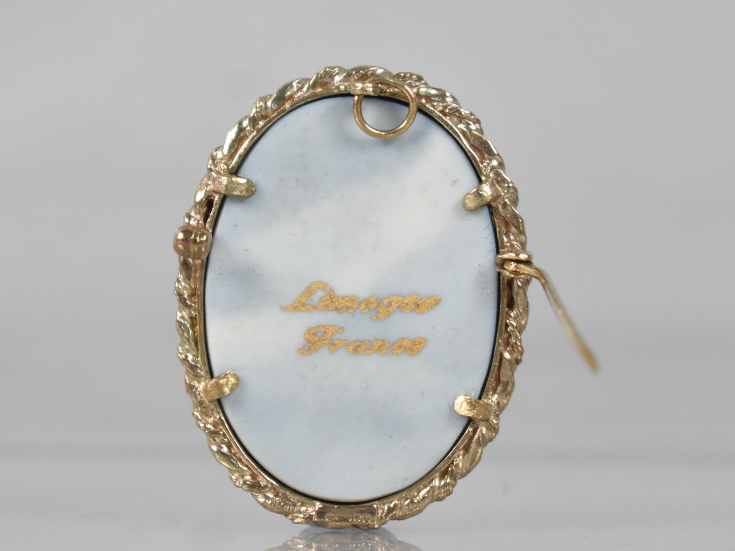 A 9ct Gold Framed Limoges Brooch, Blue Enamelled Ground with Gilt Decoration Depicting Lovers in - Image 2 of 2