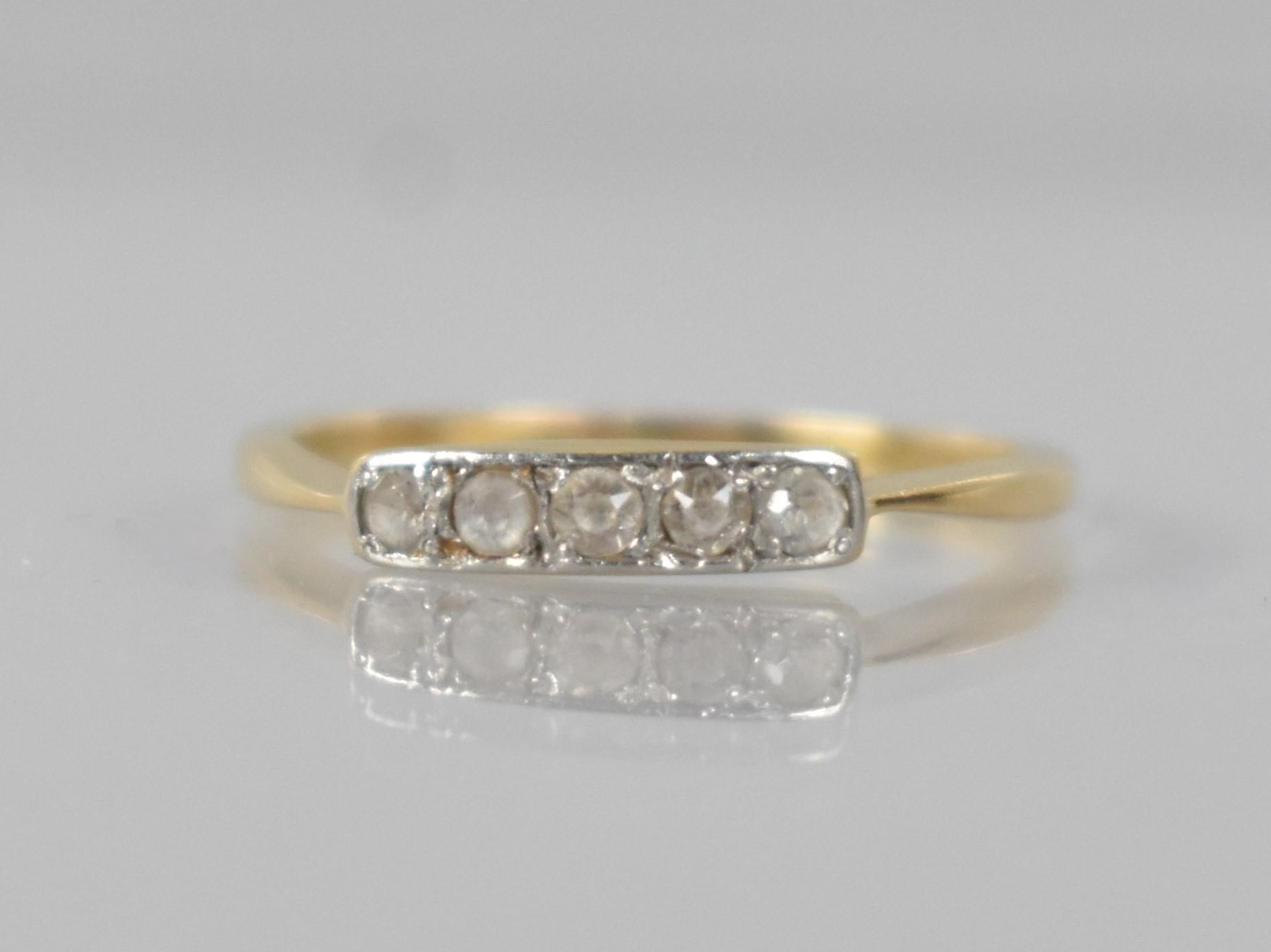 An Early 20th Century White Sapphire (One Stone Replaced) and Gold Metal Ladies Dress Ring, Line Set