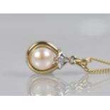 A 9ct Gold Pendant, Pearl with Bead Bright Set Diamond, on 9ct Gold Italian Flattened Curb Link