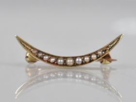 A Victorian 14ct Gold and Seed Pearl Crescent Moon Brooch, 24.2mm Wide, Missing One Pearl, Stamped