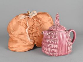A Ye Daintee Ladyee Pink Glazed Teapot Together with an Early/Mid 20th Century Teapot Cosy in the