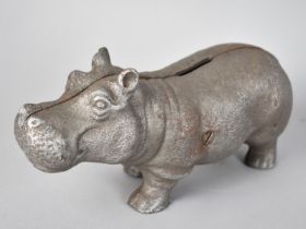 A Reproduction Cast Metal Novelty Money Box in the Form of a Hippo, 20cms Long, Plus VAT