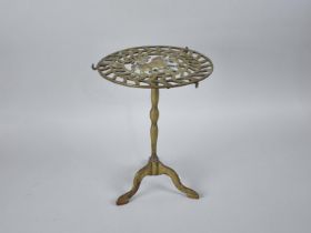 A Reproduction Brass Trivet with Pierced Circular Top Decorated with Trotting Horse, Tripod Stand,