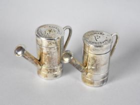 A Pair of Silver Plated Culinary Concepts Novelty Salt and Pepper Pots in the Form of Watering Cans,