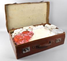 A Vintage Leather Travelling Case Containing Linens, Lace Etc