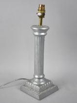 A Modern Silver Painted Composition Table Lamp Base in the form on Reeded Column on Stepped Square