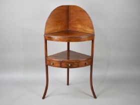 A Mahogany Bow Fronted Gentleman's Wash Stand with Galleried Top, Centre Drawer Flanked by