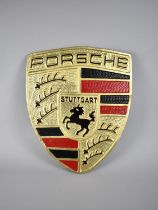 A Large Reproduction Cold Painted Cast Metal Sign for Porsche, 57cms High and 46cms Wide plus VAT