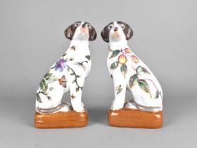 A Pair of Chinese Glazed Stoneware Figures of Seated Dogs, 20cms High