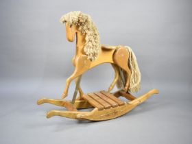 A 1988 American Wooden Rocking Horse, The Offical Lloyd Rogers by Barrels of Fun, California, 103cms